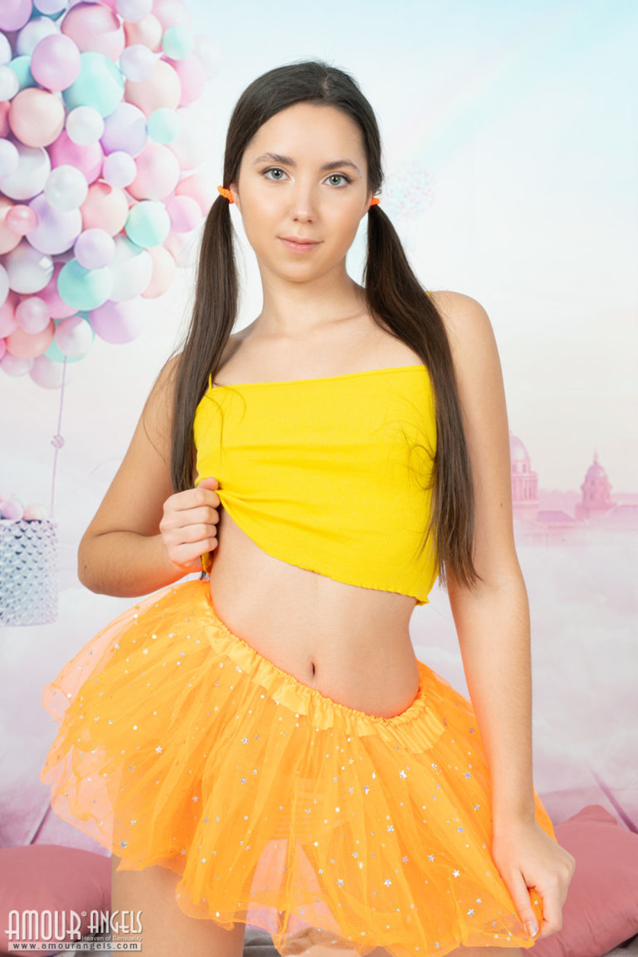 Cutie in yellow stripping 02
